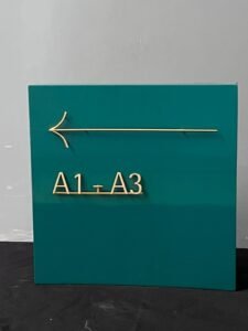 green color way findig signage , a arrow and a1 and a3 shown in signage