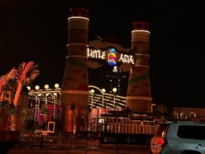 a signage board that written little Aisa in a entrance of exhibition